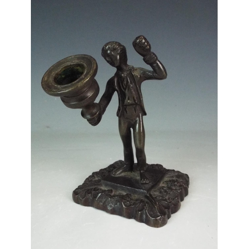 352 - Bronze torchier figure.  4 inches tall.