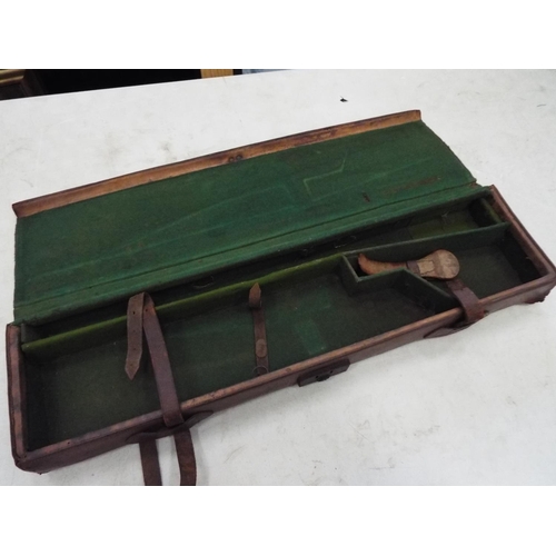 358 - Old leather shotgun case with green baize lining