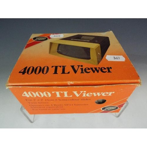 369 - Boots 4000TL slide viewer for 2 x 2 inch slides.  Original box, appears to be in unused condition.