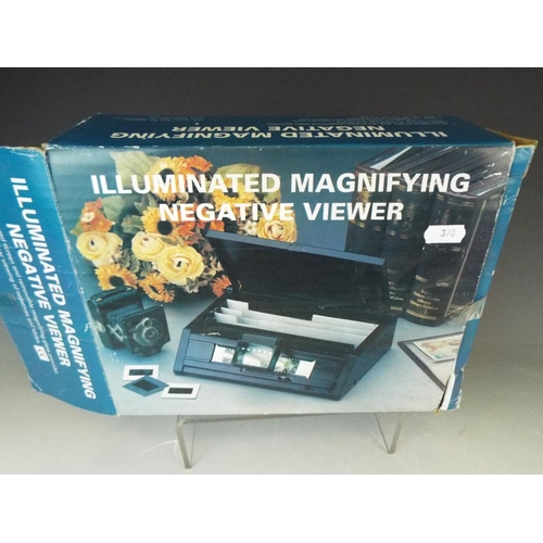 370 - Illuminated Magnifying negative viewer. Appears to be in unused condtion. Original box in scruffy co... 