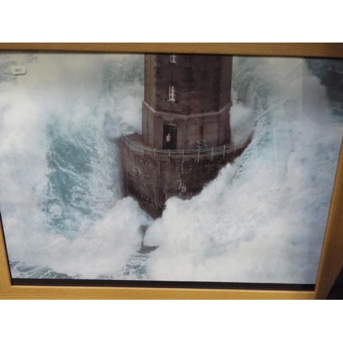 656 - Framed and mounted photo of a lighthouse in stormy sea plus framed mirror