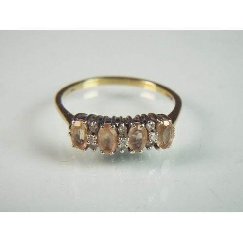 117 - 18ct ring set with four pink Topaz with small Diamonds in accompanyment. Lager ring at finger size '... 