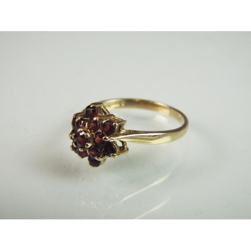 120 - 9ct Garnet set cluster ring. Finger size 'P-5'   2.2g