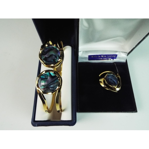 153 - 22ct Gold plated spring loaded bangle and matching pin set with Abalone shell.