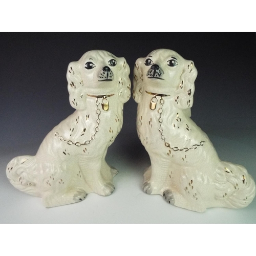 16 - Pair of Reproduction Victorian style flat back mantle spaniels, each 12 inches tall