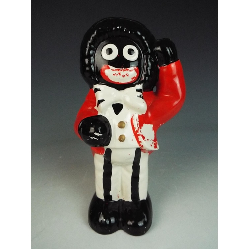 21 - 20th Century ceramic golly money bank, 9 inches tall. (no rubber stopper) age related wear