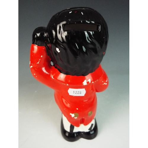 21 - 20th Century ceramic golly money bank, 9 inches tall. (no rubber stopper) age related wear