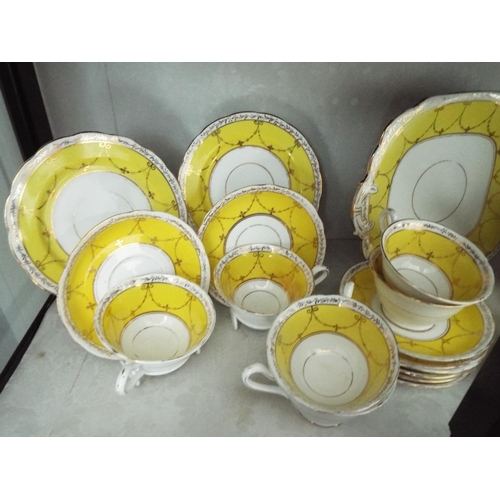 59 - Pretty , early 20th Century Grosvenor china tea set by Jackson-Gosling ltd. 35 pieces.
Hairline to t... 