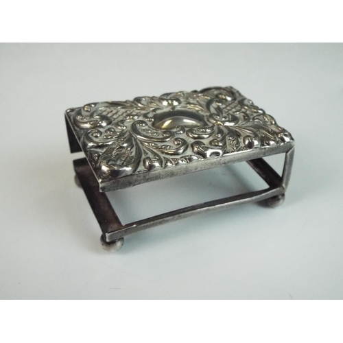 191 - Small silver matchbox holder with repousse decoration to lid. Some repairs needed. 45mm long. Birmin... 