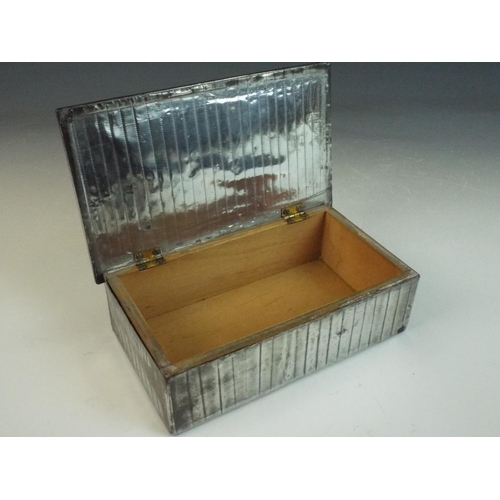 198 - Silver plated wooden cigarette box. 6.5 X 4 inches.