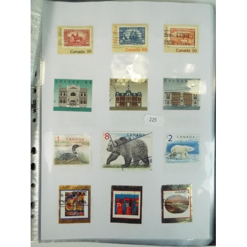 225 - Well presented albums of stamps from Canada and New Zealand. Some mint.