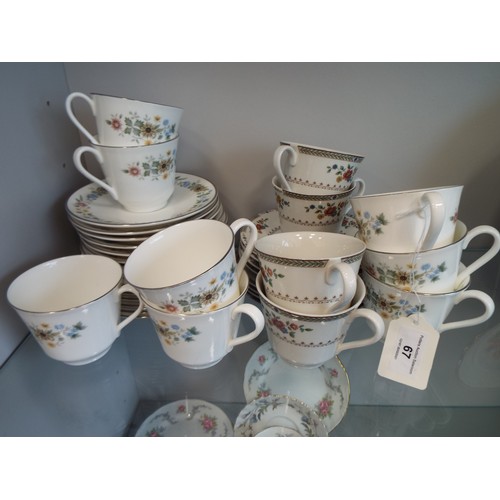 67 - Royal Doulton cups and saucers in the Pastorale and Kingswood pattern. Approx 35 pieces