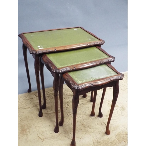 398 - Nest of three leather topped tables