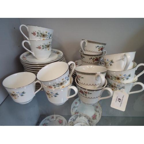 67 - Royal Doulton cups and saucers in the Pastorale and Kingswood pattern. Approx 35 pieces