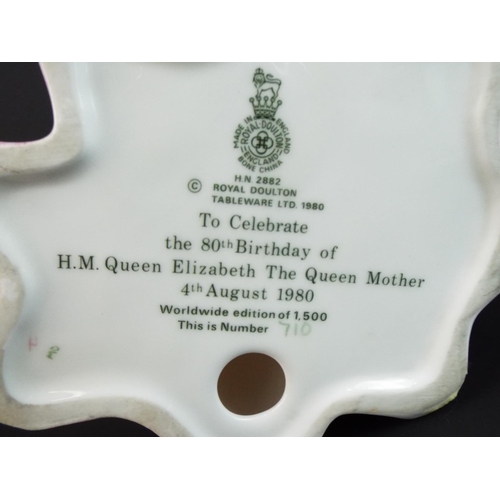 11 - Ltd Edition, Royal Doulton figurine of the Queen Mum HN2882 (1980) with repair to hand together with... 