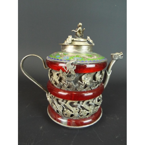 118 - Small Chinese teapot in white metal. Featuring decorated Cloisonne ring to top showing dragons plus ... 