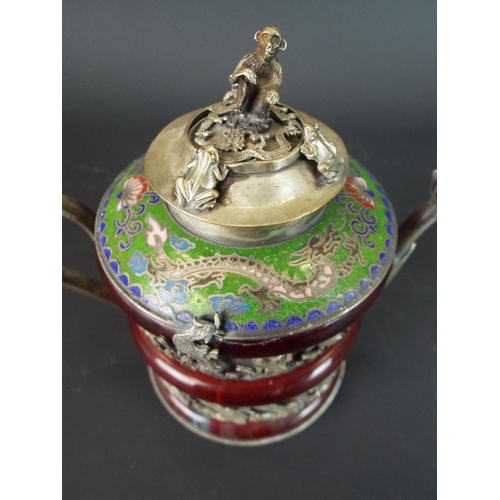 118 - Small Chinese teapot in white metal. Featuring decorated Cloisonne ring to top showing dragons plus ... 