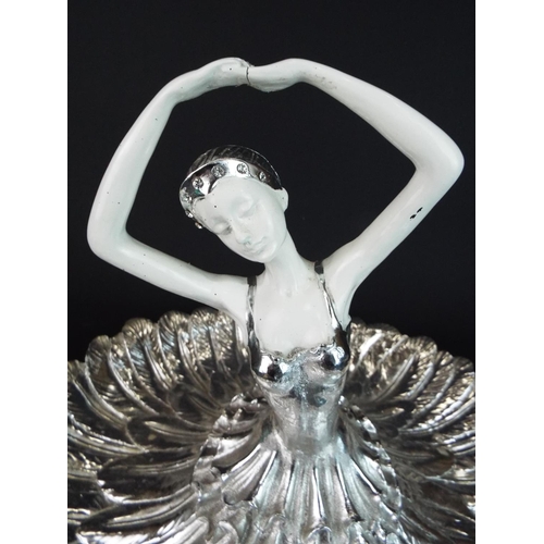 12 - Large and heavy table centre piece as a Ballerina. 12 inches tall, 15 inches in diameter. Light flak... 