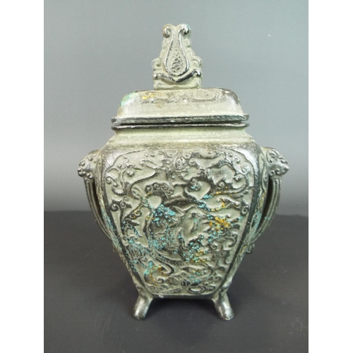 120 - Bronze twin handled and lidded temple jar with pierced lid. Decorated with Dragons & flowers  5.5 in... 