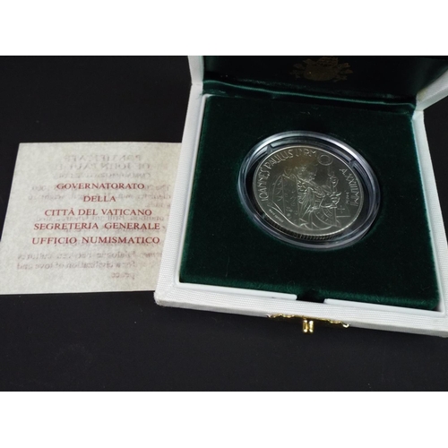 168 - Pope John Paul commemorative coin struck in 825 silver. Mint condition with original case and certif... 