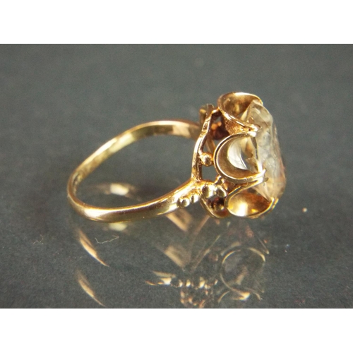 70 - Large citrene set ring (12 x7 mm)  set in an attractive basket form 9ct mount.  Finger size 'L#   3.... 