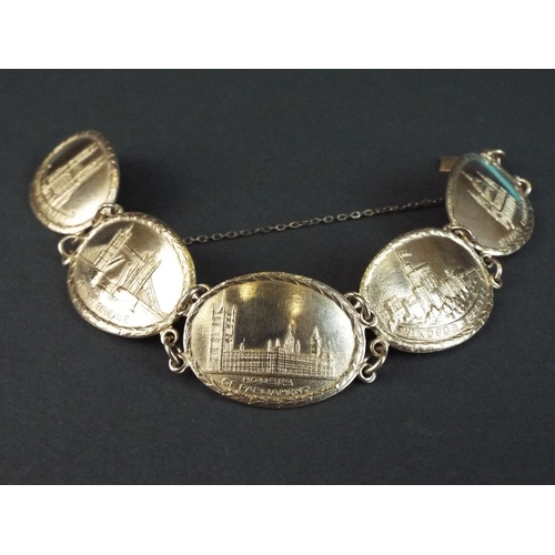 80 - Hallmarked silver panel bracelet showing famous London Landmarks. 32.9g   7.5 inches long. London 19... 