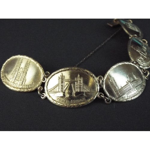 80 - Hallmarked silver panel bracelet showing famous London Landmarks. 32.9g   7.5 inches long. London 19... 