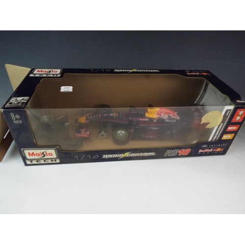 29 - Maisto 1:14 Scale radio controlled Red Bull F1 car with original box. Working condition unknown.