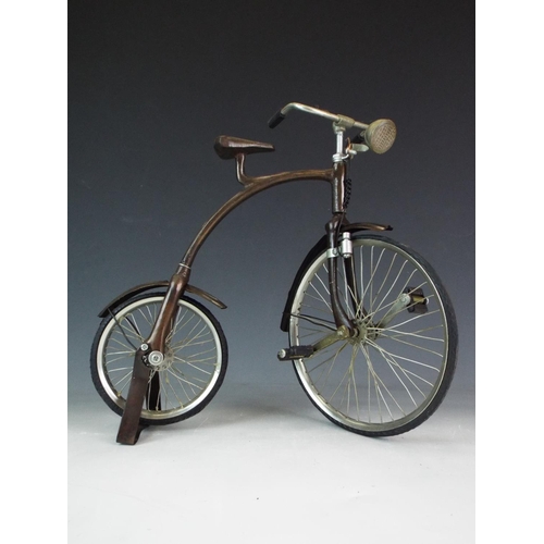 6 - Detailed metal model of a penny farthing type cycle. Working crank and rubber wheels. Measures 10 in... 