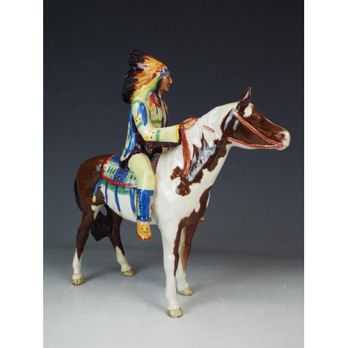 144 - Beswick Mounted Indian Chief on a Skewbald Pony Model 1391. REPAIR TO REAR LEG