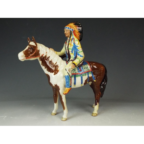 144 - Beswick Mounted Indian Chief on a Skewbald Pony Model 1391. REPAIR TO REAR LEG