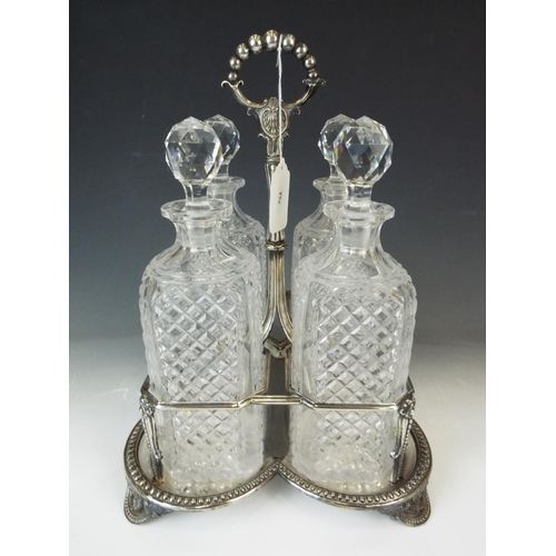 156 - Beautiful Four bottle decanter by Elkingtons. Each bottle undamaged with matching stoppers. Collecte... 