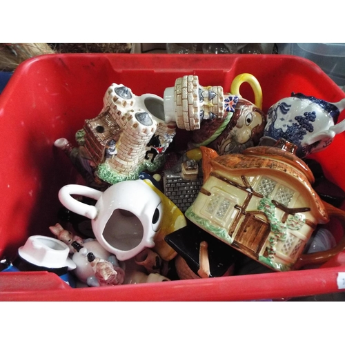 1109 - Two boxes of assorted decorative teapots, jugs etc. see photo