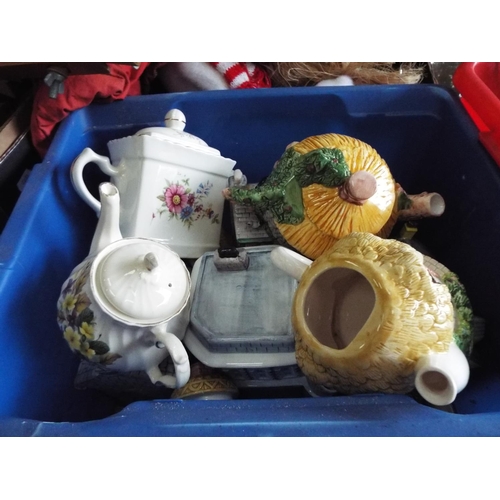 1109 - Two boxes of assorted decorative teapots, jugs etc. see photo