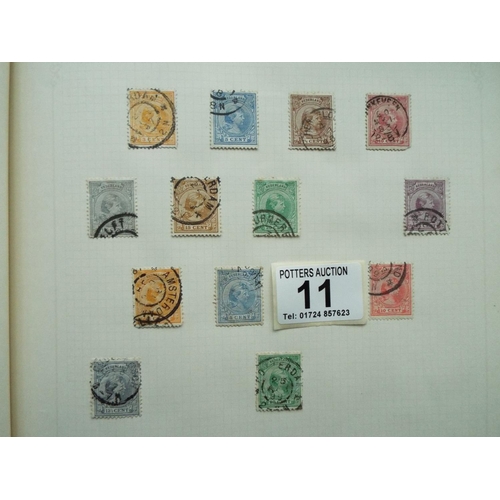 11 - Four part filled albums of assorted world stamps. See photos