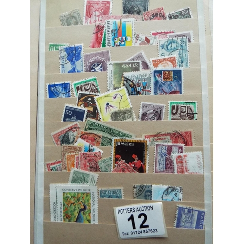 12 - Five part filled albums of assorted Stamps of the World . See photos