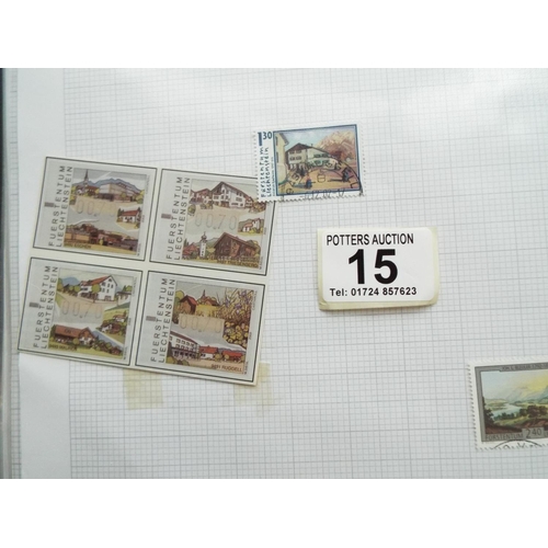 15 - Four part filled albums of assorted world stamps. See photos