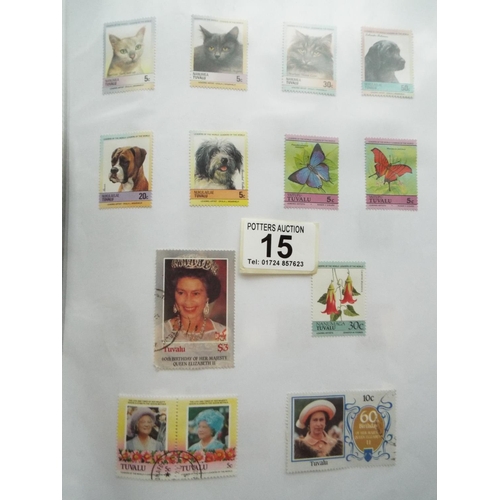 15 - Four part filled albums of assorted world stamps. See photos