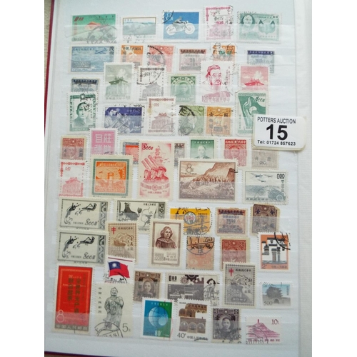 15 - Four part filled albums of assorted world stamps. See photos