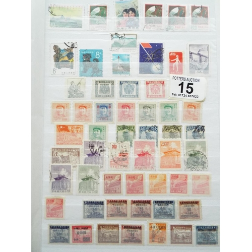 15 - Four part filled albums of assorted world stamps. See photos