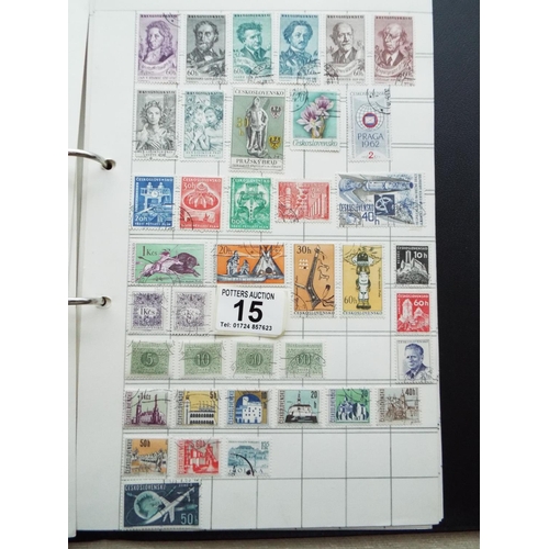 15 - Four part filled albums of assorted world stamps. See photos