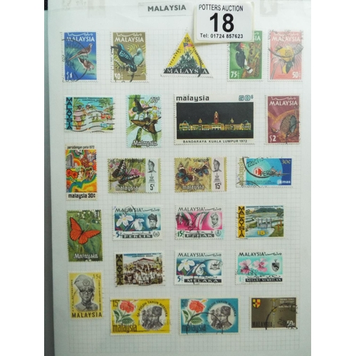 18 - Four part filled albums of assorted world stamps. See photos