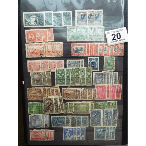 20 - Four part filled albums of assorted world stamps. See photos