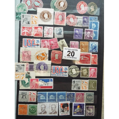 20 - Four part filled albums of assorted world stamps. See photos