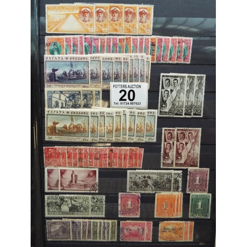 20 - Four part filled albums of assorted world stamps. See photos