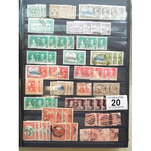 20 - Four part filled albums of assorted world stamps. See photos