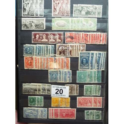 20 - Four part filled albums of assorted world stamps. See photos