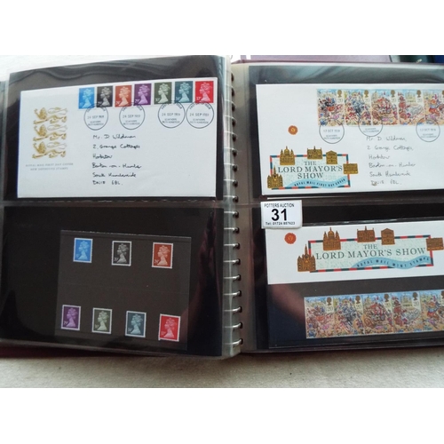 31 - Nicely presented album of 1899-1990 GB first day covers, approx 50 plus a small selection of mint st... 