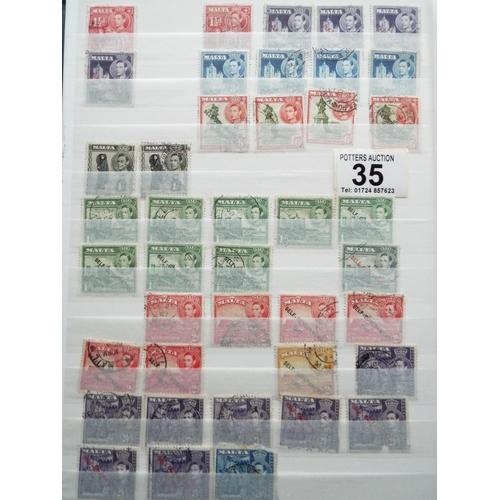 35 - Well filled album of Stock Stamps, Part filled album of Middle Eastern countries plus one other. See... 