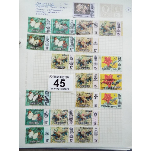 45 - Four small but well filled albums of World Stamps to include GB. See photos